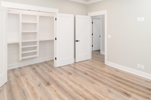 unfurnished bedroom featuring light hardwood / wood-style floors