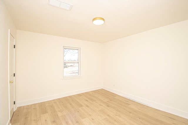 unfurnished room featuring light wood-type flooring