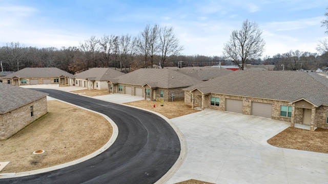 single story home with a garage