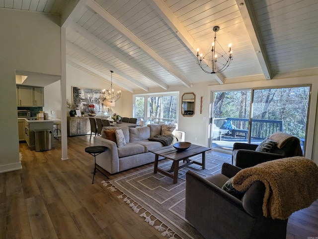 living room featuring a notable chandelier, dark wood-type flooring, and lofted ceiling with beams