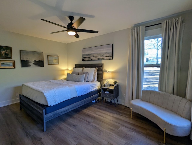 bedroom featuring wood-type flooring and ceiling fan