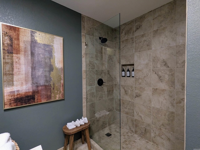 bathroom featuring tiled shower