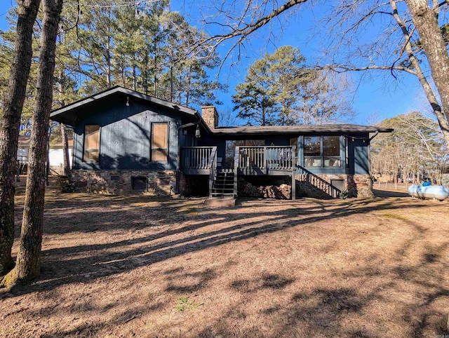 view of front of property featuring a deck