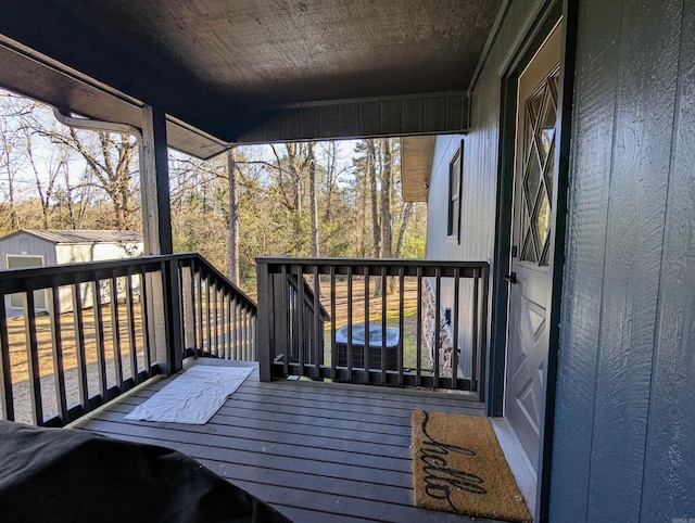 deck with a storage shed