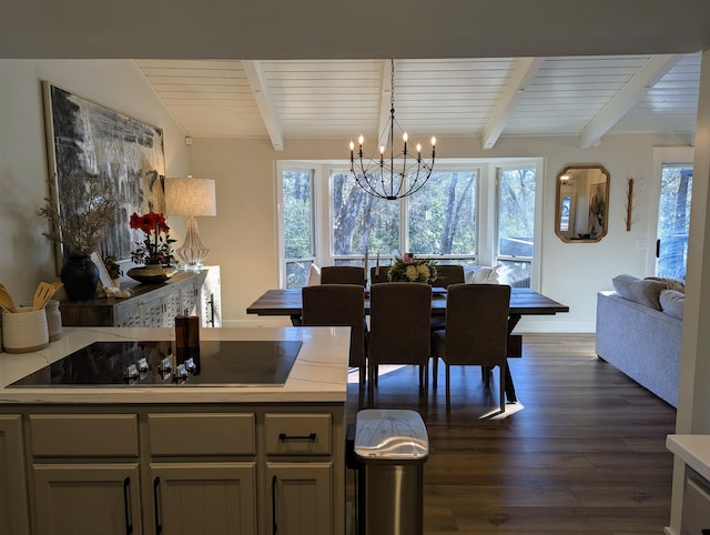 dining space featuring dark hardwood / wood-style flooring, a notable chandelier, and beam ceiling