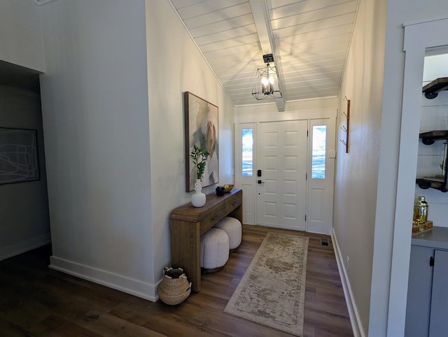 entrance foyer with dark wood-type flooring, wood ceiling, and vaulted ceiling with beams