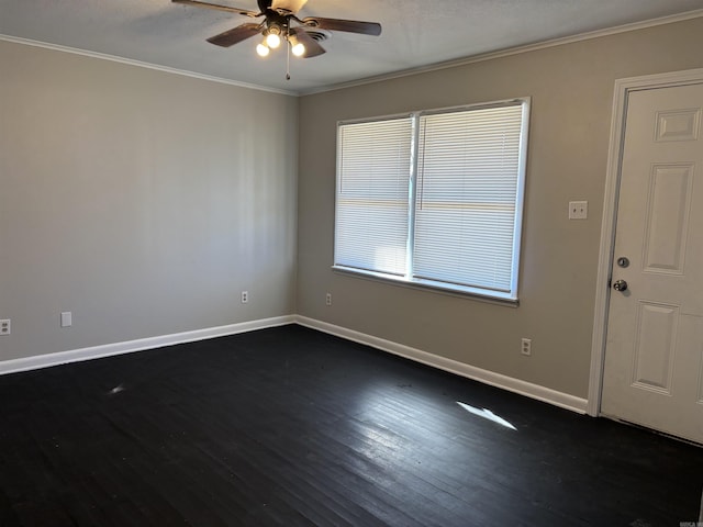 foyer entrance with crown molding, dark hardwood / wood-style floors, and ceiling fan