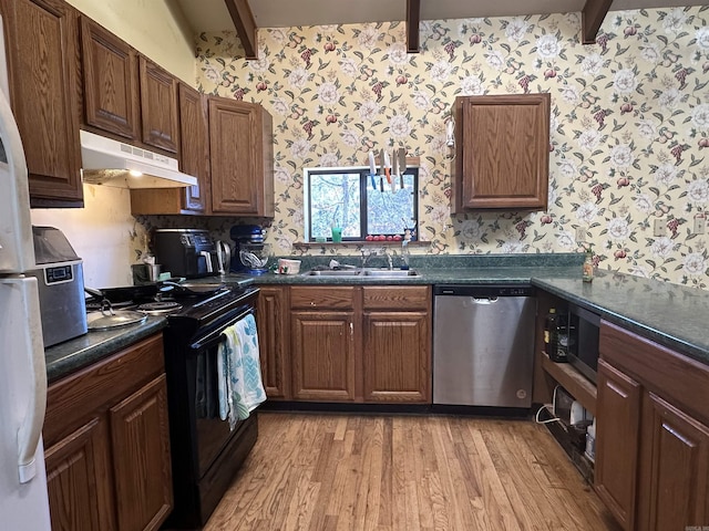 kitchen featuring sink, dishwasher, lofted ceiling with beams, black / electric stove, and light wood-type flooring