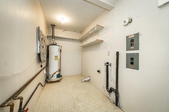 utility room featuring electric panel and water heater