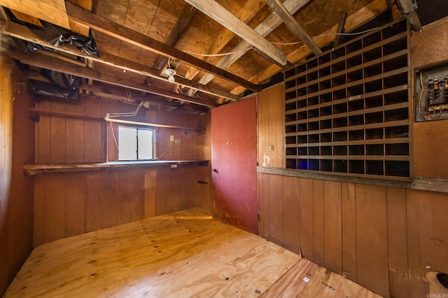 interior space featuring wooden walls