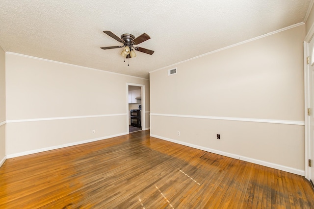 unfurnished room featuring crown molding, hardwood / wood-style flooring, a textured ceiling, and ceiling fan