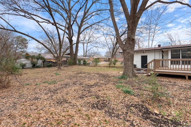 view of yard with a wooden deck