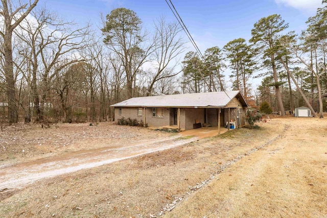 view of outbuilding featuring a carport