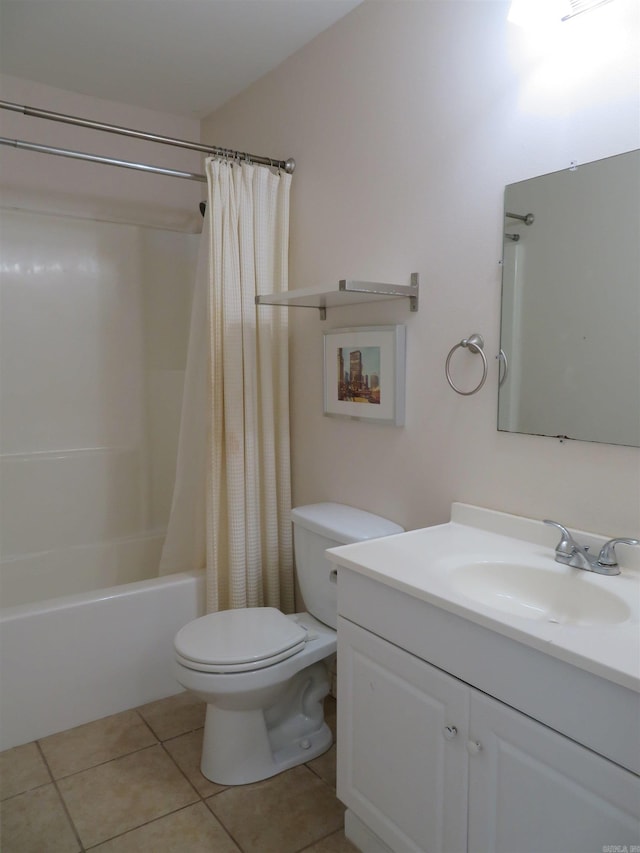 full bathroom with tile patterned flooring, shower / bath combo, vanity, and toilet