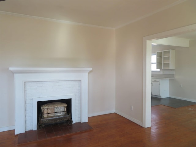 details with crown molding, hardwood / wood-style flooring, and a fireplace