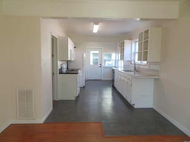 kitchen with white cabinetry, sink, crown molding, and white appliances