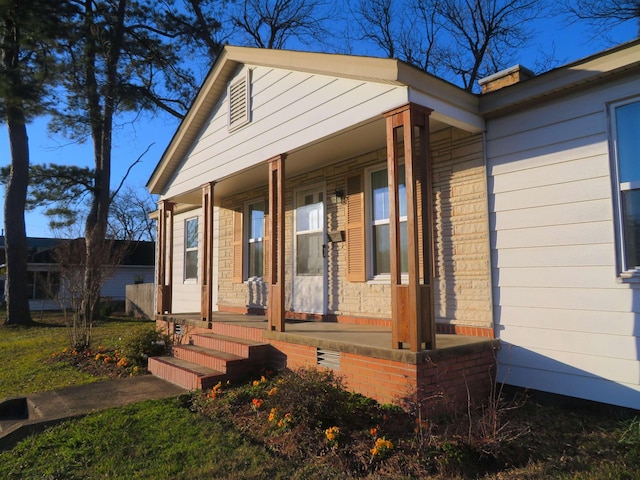 exterior space featuring covered porch