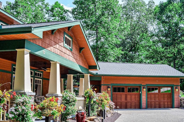 exterior space with a garage and a porch