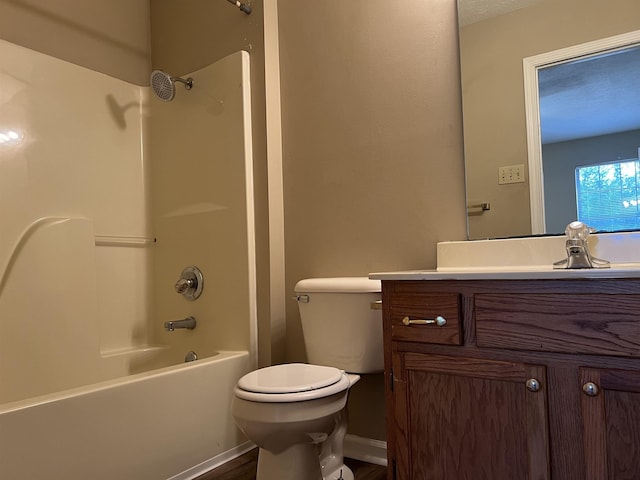 full bathroom featuring vanity, shower / bathtub combination, and toilet