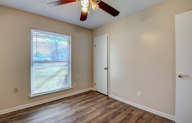 8 Woodmere Pl, Sherwood, AR 72120 - spare room with ceiling fan, wood-type flooring, and a textured ceiling