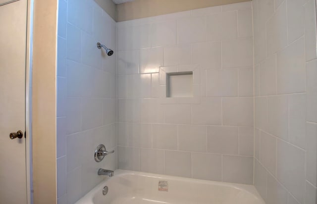 8 Woodmere Pl, Sherwood, AR 72120 - bathroom featuring tiled shower / bath combo