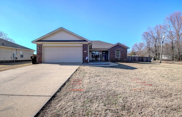 ranch-style home with a garage