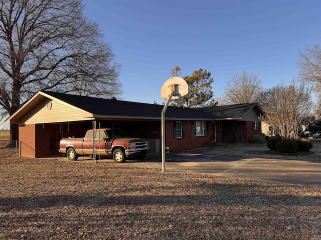 exterior space featuring a carport