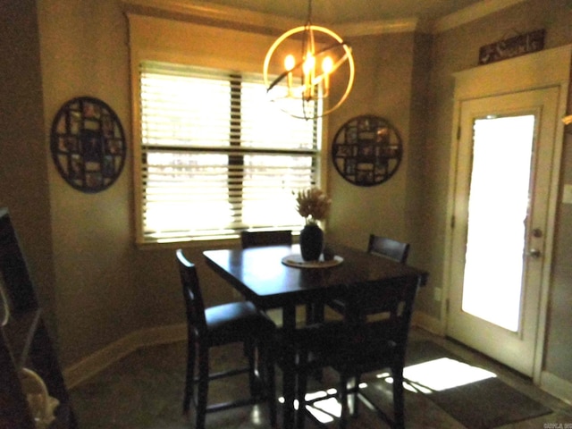 dining space with a chandelier