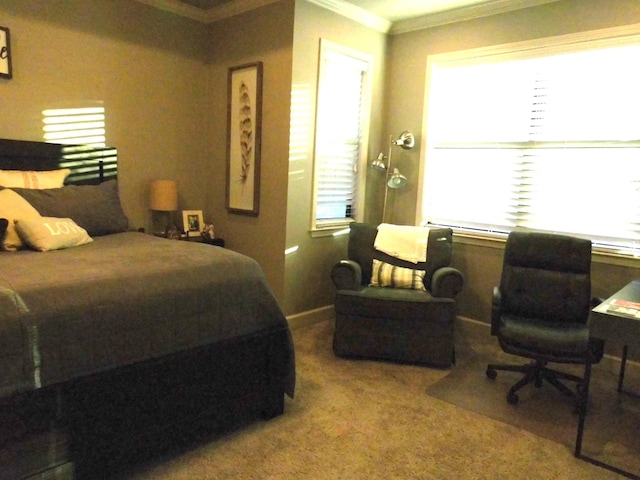 bedroom with carpet floors and ornamental molding