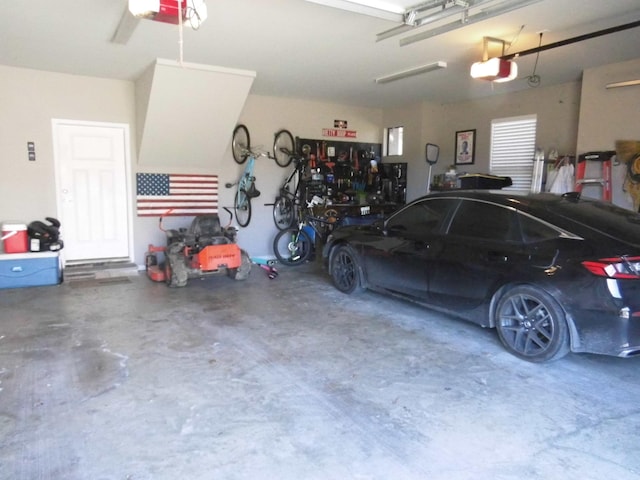 garage featuring a garage door opener