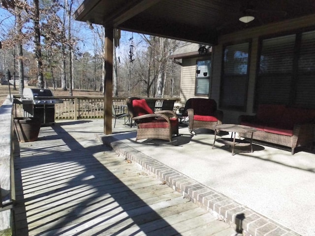 wooden deck with area for grilling