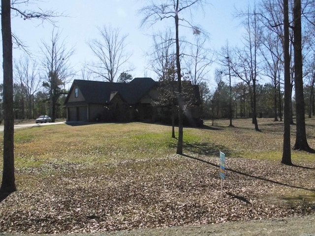 view of yard featuring a garage