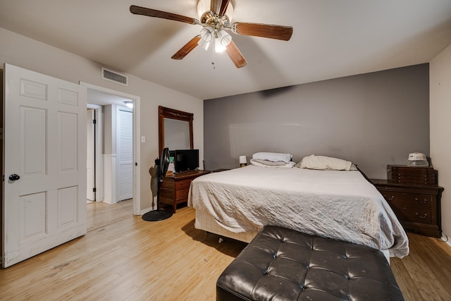 bedroom featuring ceiling fan and light hardwood / wood-style floors