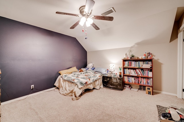 bedroom featuring vaulted ceiling, ceiling fan, and carpet