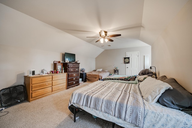 bedroom featuring lofted ceiling, carpet floors, and ceiling fan