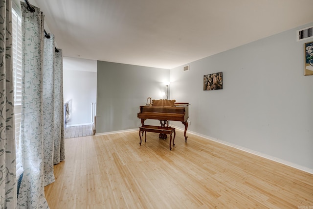 miscellaneous room with light hardwood / wood-style flooring