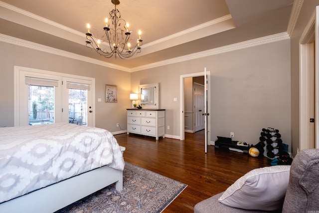 bedroom with access to exterior, ornamental molding, dark hardwood / wood-style floors, and a chandelier