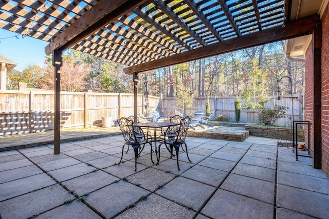 view of patio featuring a pergola