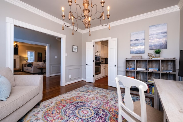 office space featuring dark wood-type flooring, ornamental molding, and an inviting chandelier