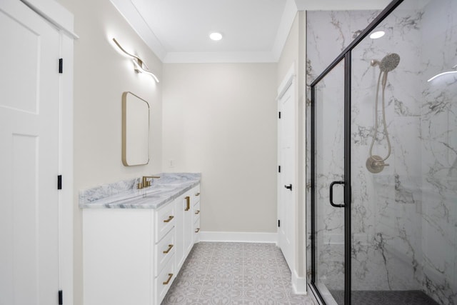 bathroom featuring vanity, crown molding, and walk in shower