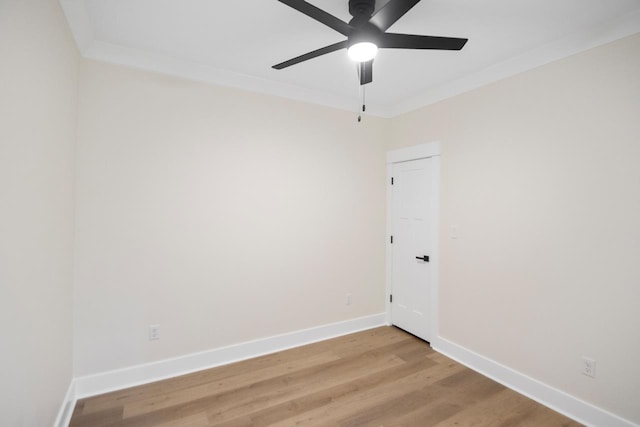 unfurnished room featuring ornamental molding, ceiling fan, and light hardwood / wood-style flooring