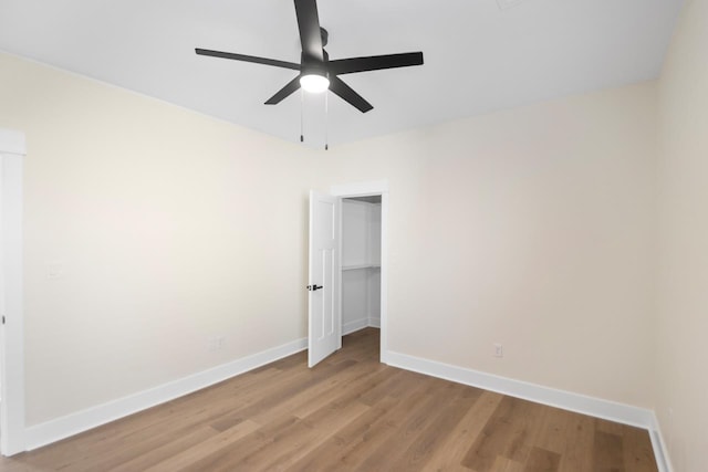 unfurnished bedroom with light wood-type flooring and ceiling fan