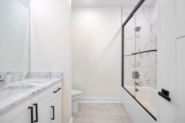 full bathroom with vanity, toilet, and combined bath / shower with glass door