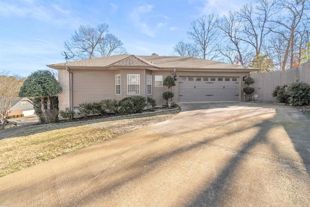 single story home featuring a garage