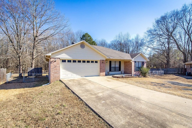 single story home with a garage and a front yard