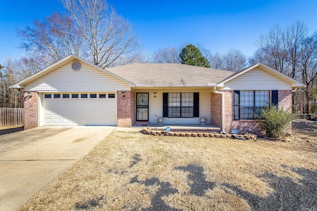 single story home featuring a garage and a porch