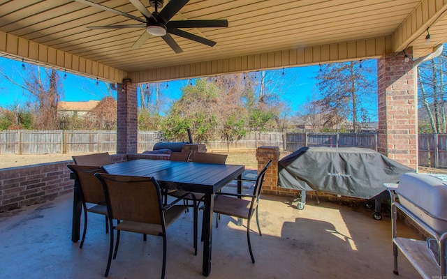 view of patio with grilling area and ceiling fan