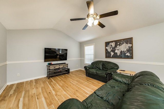 living room featuring vaulted ceiling, ceiling fan, and hardwood / wood-style floors