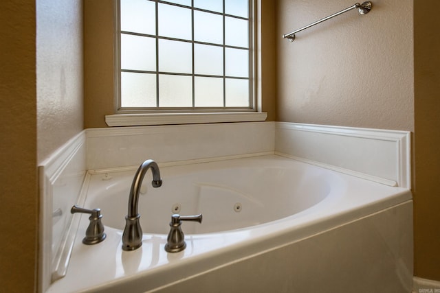 bathroom featuring a tub