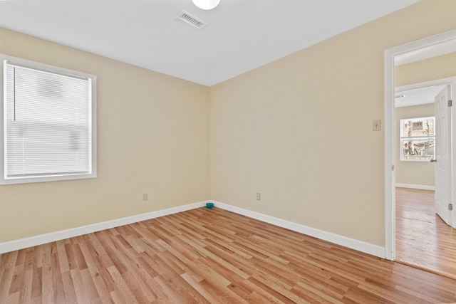 empty room featuring light hardwood / wood-style floors